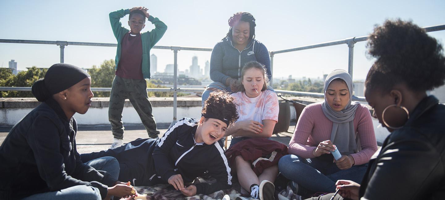 A still from the film Rocks. Depicts a group of friends hanging out.