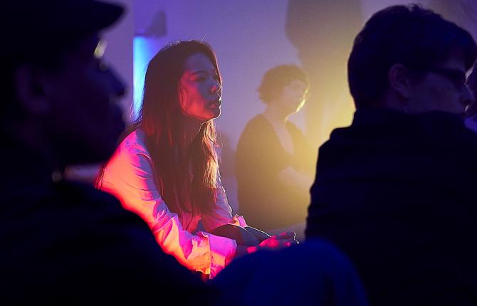 A photo of audience members at an event at Somerset House. The audience looks thoughtful and engaged.